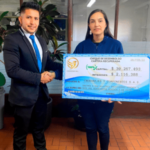 Cheque de desembolso cartera recuperada a Engranajes t componentes S.A.S Confedeuda Abogados Bogotá